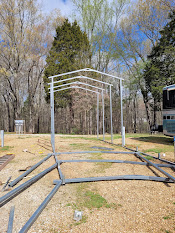 Carport metal frame at the start of construction