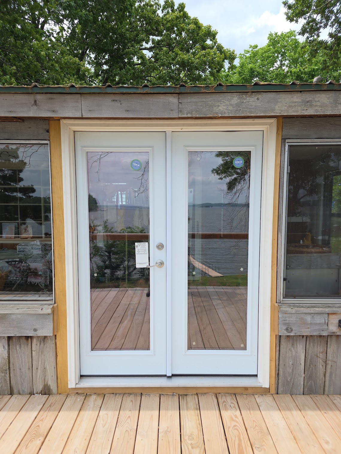 White French doors overlooking a lake