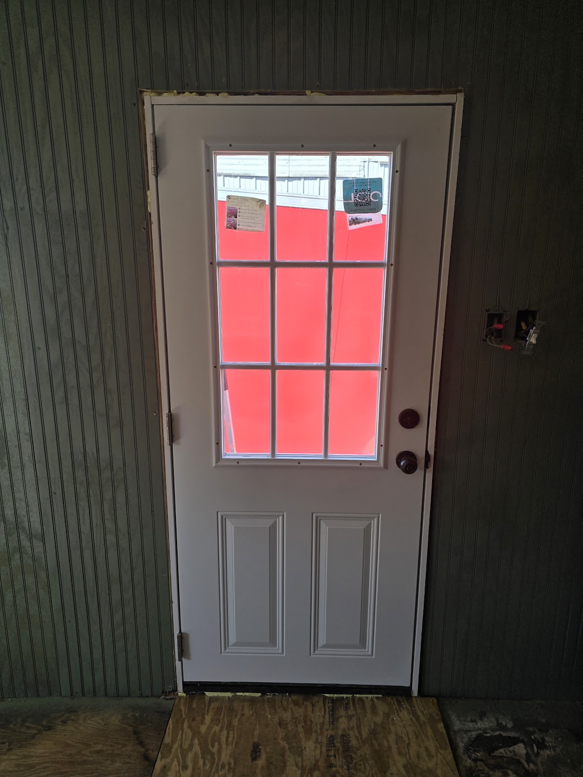 White exterior glass door installation