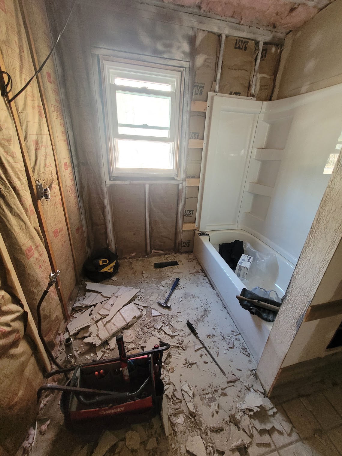 Handy Hands bathroom remodel during demolition and installation