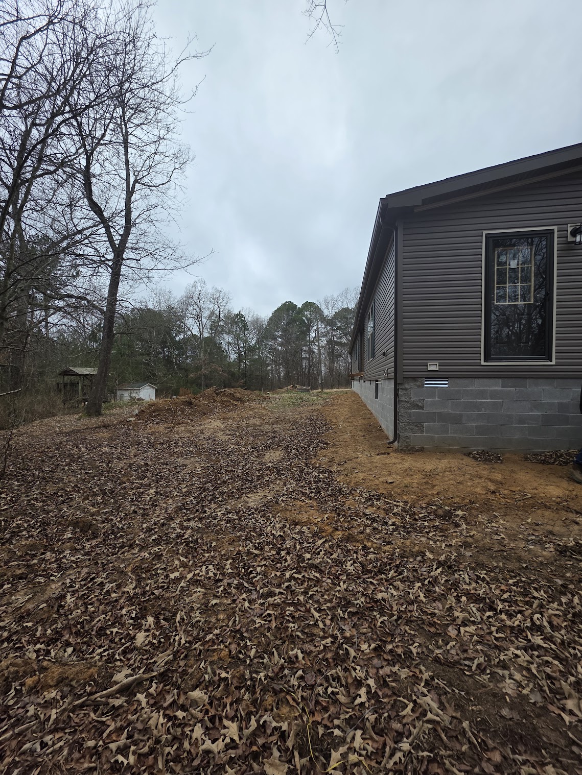 Side view of the Camden Tennessee property during deck construction