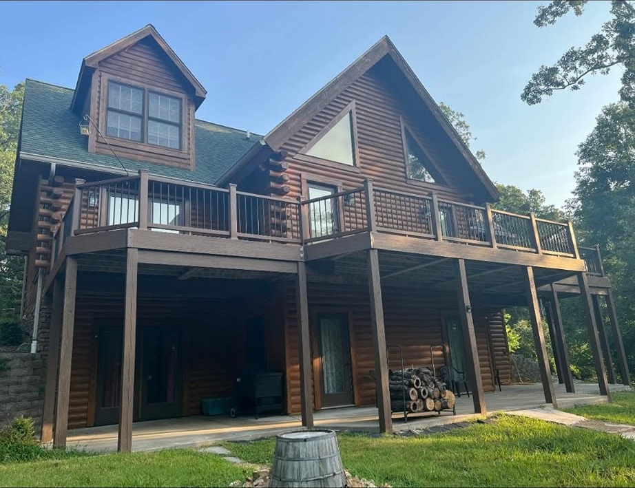 Side view of custom log home deck